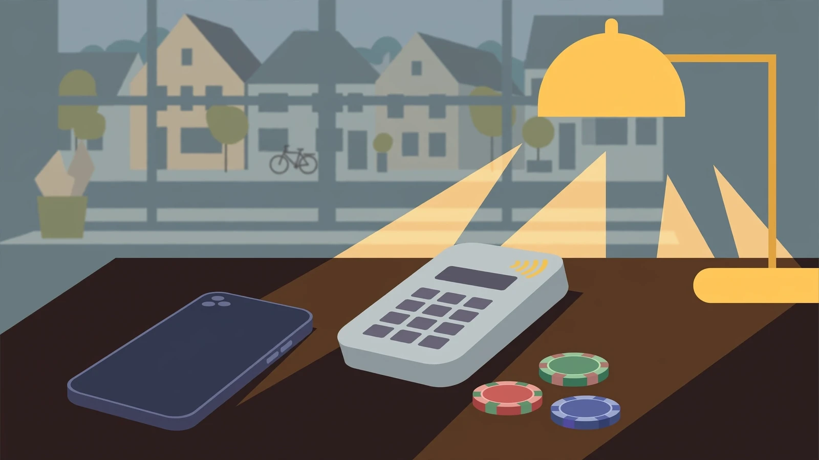 Smartphone neben Kartenterminal und Casino-Chips auf Holztisch im Abendlicht.